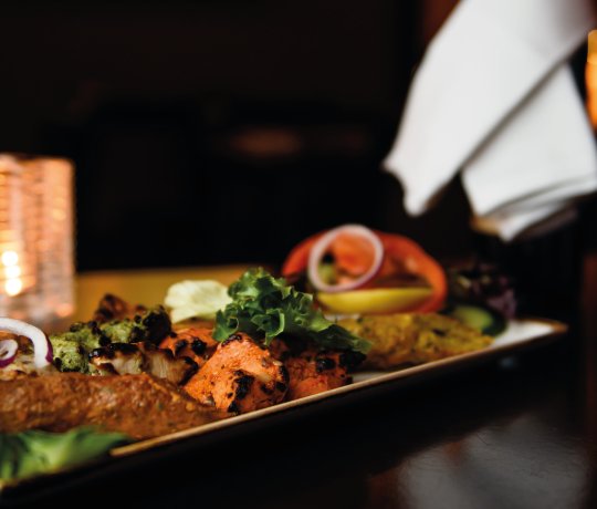 Best Punjabi Restaurant and takeaway in Northampton Punjabi dish garnished with salad